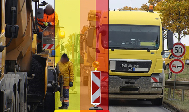 Straßenbaustelle, auf der sich links ein Baufahrzeug mit Bediener befindet und rechts rollender Lkw-Verkehr zu sehen ist. In der Mitte ist ein Bauarbeiter. Dieser Bereich ist als Gefahrenbereich gelb markiert.
