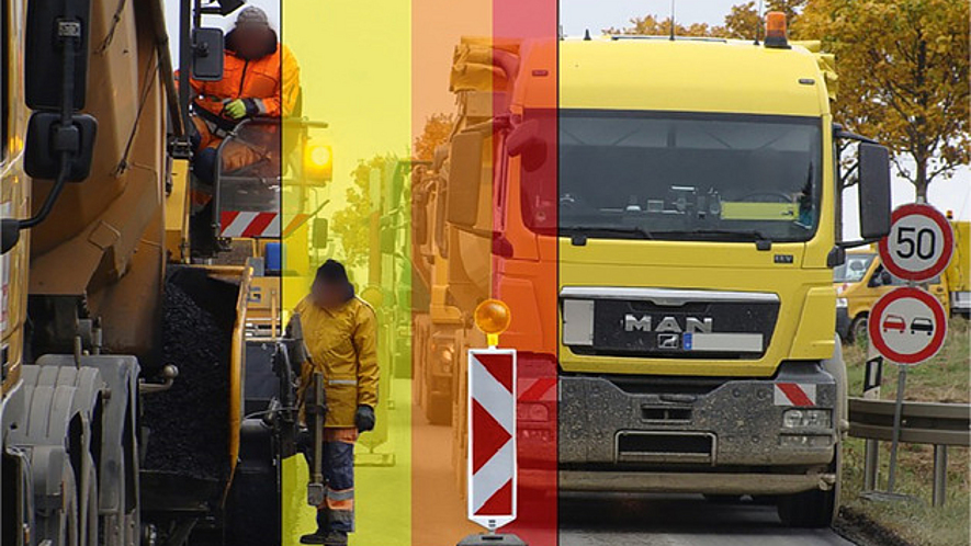 Gefahrenzone eines typischen Arbeitsplatzes an einer Straßenbaustelle Straßenbaustelle, auf der sich links ein Baufahrzeug mit Bediener befindet und rechts rollender Lkw-Verkehr zu sehen ist. In der Mitte ist ein Bauarbeiter. Dieser Bereich ist als Gefahrenbereich gelb markiert.