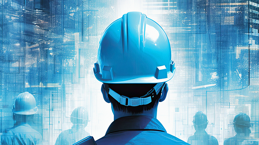 Beschäftigte mit Bauhelm vor einem Hochhaus.