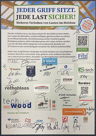 Urkunde mit Unterschriften und Logos der Unterzeichnenden der Initiative "jede Last sicher".