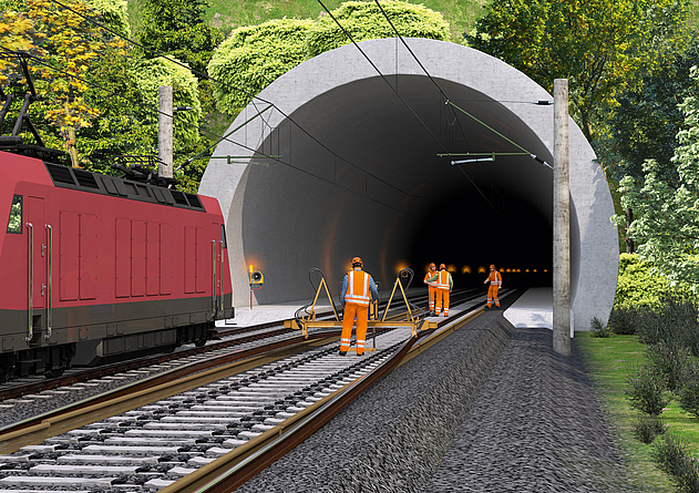 Personen bei Gleisbauarbeiten im Bereich der Tunneleinfahrt.