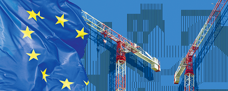 Konzept mit einer imaginären Stadtlandschaft vor einer europäischen Flagge und einem Turmdrehkran.