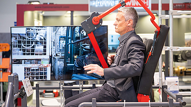 BG BAU-Messestand Bauma 2022 Eine Vorführung auf dem BG BAU-Messestand der Bauma 2022.