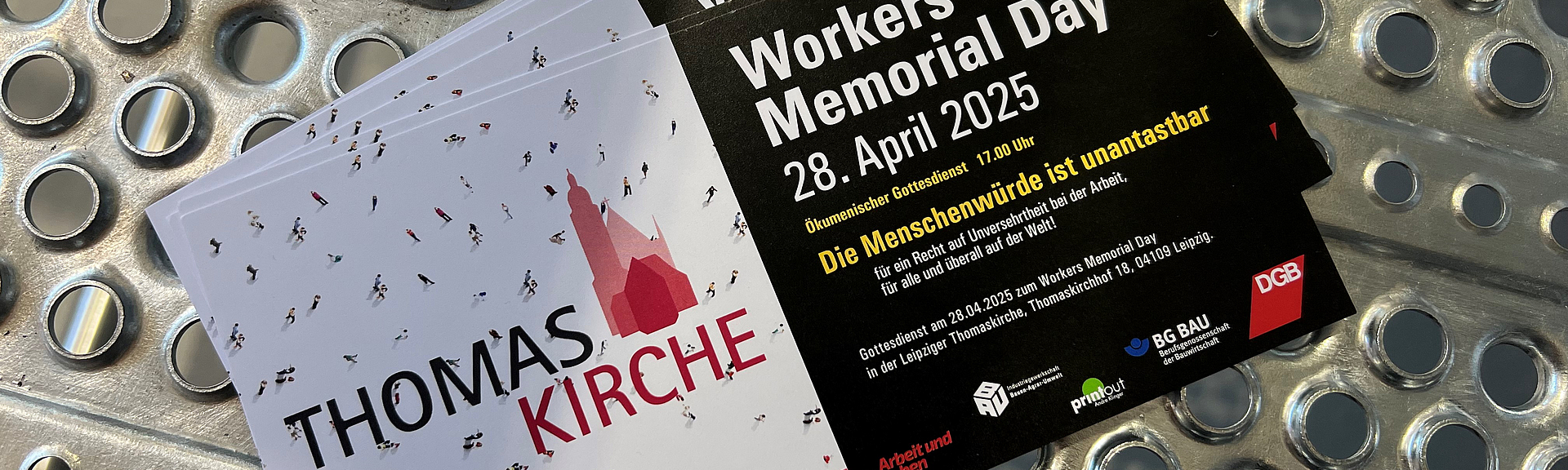 Eine Einladungskarte der IG BAU, die zum Workers Memorial Day zu einem Gottesdienst einlädt.