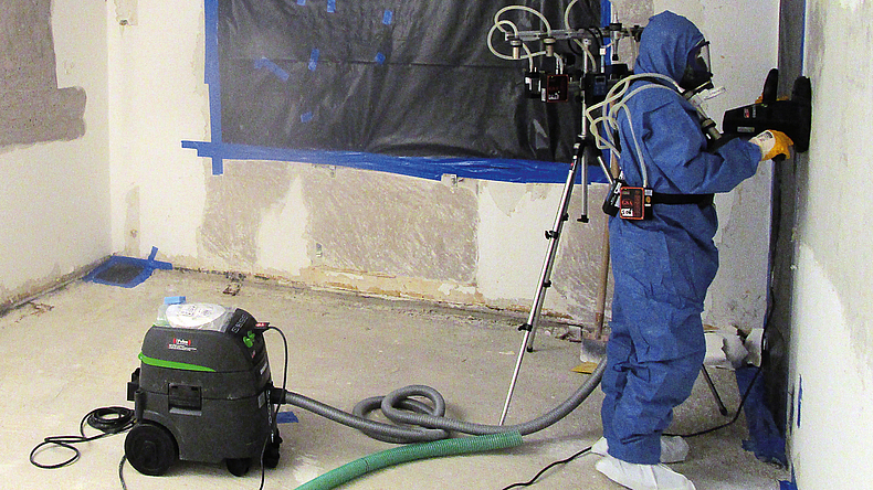 Abschleifen asbesthaltiger Spachtelmassevon Beton mit abgesaugtem System und messtechnischer Begleitung